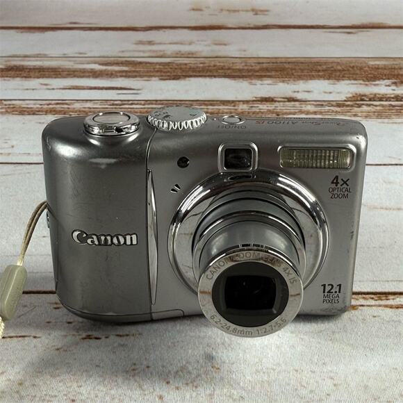 Canon PowerShot A1100 IS Silver Digital Camera – 12.1MP, 4x Zoom + Charger - Picture 1 of 6